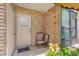 Relaxing brick patio area with outdoor seating, plants and view of neighborhood at 200 St Andrews Blvd # 802, Winter Park, FL 32792