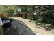 Backyard with a stone patio and foliage at 324 River Chase Dr, Orlando, FL 32807