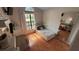 Cozy bedroom with a twin bed, a window, and neutral walls at 324 River Chase Dr, Orlando, FL 32807
