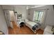 Bedroom with a large window and a bed at 324 River Chase Dr, Orlando, FL 32807