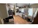 Traditional kitchen with white cabinets, stainless steel appliances, and light countertops at 324 River Chase Dr, Orlando, FL 32807
