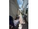 Enclosed backyard patio area with brick pavers and comfortable seating arrangement at 4152 Pino St, Apopka, FL 32712