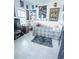 Modern bedroom with neutral walls, decorative posters, and a cozy area rug at 4152 Pino St, Apopka, FL 32712