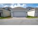 Detached one car garage with brick paved driveway in a residential neighborhood at 4152 Pino St, Apopka, FL 32712