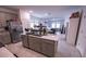 Spacious kitchen featuring modern appliances, an island, and an open floor plan at 4152 Pino St, Apopka, FL 32712