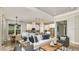 Spacious living room integrating kitchen and dining areas for seamless entertaining at 858 Arbor Green Trl, St Cloud, FL 34771