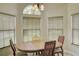 Bright dining area with natural light, perfect for Gathering meals or entertaining guests at 643 Oregon Woods Ct, Orlando, FL 32824