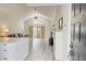 Open-concept living area with vaulted ceilings, lots of natural light, and modern finishes at 643 Oregon Woods Ct, Orlando, FL 32824