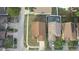 Aerial shot of the home's roof, backyard, and surroundings in a residential neighborhood at 1639 Stanbury Dr, Orlando, FL 32818
