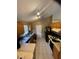 Functional kitchen featuring laminate countertops, a double sink, and updated appliances at 1639 Stanbury Dr, Orlando, FL 32818