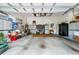 Spacious garage with ample storage cabinets and room for multiple vehicles, plus lots of gear at 785 Hawks Bluff, Clermont, FL 34711
