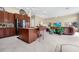 Open-concept kitchen with island seating that flows seamlessly into the living area at 785 Hawks Bluff, Clermont, FL 34711