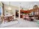 Bright kitchen, adjacent to the dining room, featuring modern appliances and ample cabinet space at 785 Hawks Bluff, Clermont, FL 34711