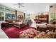 Open-concept living space showcasing a living room and connecting kitchen at 785 Hawks Bluff, Clermont, FL 34711