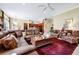 Expansive living room with a comfortable seating area and an open layout at 785 Hawks Bluff, Clermont, FL 34711
