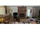 Cozy living room featuring a brick fireplace, natural light, and space for relaxing at 1405 Ridgegreen N Loop, Lakeland, FL 33809