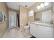 Bathroom featuring tile floors, a shower and a vanity with a sink at 344 Barbera Dr, Davenport, FL 33897