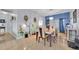 Bright dining area with stylish table and view into adjacent rooms at 675 Elbridge Dr, Kissimmee, FL 34758
