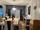 Dining room with lots of decorations and dining table with chairs at 675 Elbridge Dr, Kissimmee, FL 34758