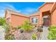Charming home with a well-maintained front yard featuring lush landscaping at 675 Elbridge Dr, Kissimmee, FL 34758