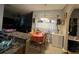 Cozy eat-in kitchen featuring granite countertops and dining area with bright window at 675 Elbridge Dr, Kissimmee, FL 34758