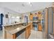 Modern kitchen with stainless steel appliances and granite countertops at 675 Elbridge Dr, Kissimmee, FL 34758
