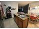 Kitchen with granite countertops and a view to the living room at 675 Elbridge Dr, Kissimmee, FL 34758