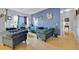 Spacious living area with plush seating, fireplace, and stylish decor at 675 Elbridge Dr, Kissimmee, FL 34758