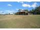 Large acreage farm with a rustic white barn and open pastures, offering a peaceful rural lifestyle and opportunities for agriculture at 2198 W Highway 329, Citra, FL 32113