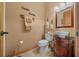 Charming bathroom with vanity and black granite counter, vessel sink, and rustic accents at 2198 W Highway 329, Citra, FL 32113