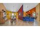 Dining area featuring a western-themed chandelier and decor, an adjacent breakfast bar and colorful walls at 2198 W Highway 329, Citra, FL 32113