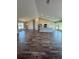 Open floor plan with bright living space, new floors, and high ceilings at 6711 Sw 64Th Ave, Ocala, FL 34476
