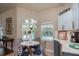 Cozy breakfast nook with pool views at 10411 Sw 52Nd Ct, Ocala, FL 34476