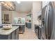 Spacious kitchen featuring an island, stainless steel appliances, and an open layout at 10411 Sw 52Nd Ct, Ocala, FL 34476