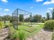 Private backyard golf course includes a covered tee box and putting green at 10621 Sw 11Th Ter, Ocala, FL 34476