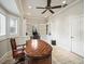 Beautiful office with built-in shelving, a ceiling fan and large windows offering ample natural light at 10621 Sw 11Th Ter, Ocala, FL 34476