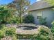 A backyard spa offers a serene space nestled amidst lush greenery for relaxation and rejuvenation at 10621 Sw 11Th Ter, Ocala, FL 34476