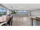 Dining area with water views and access to a relaxing living area at 22345 Ne 108Th Avenue Rd, Fort Mc Coy, FL 32134