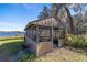 Screened gazebo overlooking the lake at 22345 Ne 108Th Avenue Rd, Fort Mc Coy, FL 32134