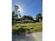 Single story house with yard, viewed from the street at 6044 Nw 65Th Pl, Ocala, FL 34482