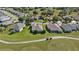 Aerial view of homes on a golf course community at 12900 Se 97Th Terrace Rd, Summerfield, FL 34491