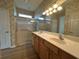 Bathroom boasts double sinks and walk-in shower at 12900 Se 97Th Terrace Rd, Summerfield, FL 34491