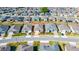 Aerial view of a home in a well-planned community with neatly arranged houses and landscaping at 4336 Nw 55Th Ct, Ocala, FL 34482