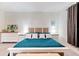 Main bedroom featuring a neutral color scheme, a king bed and wood furnishings at 4336 Nw 55Th Ct, Ocala, FL 34482