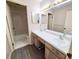 Bathroom with double sinks and shower/tub combo at 19728 Sw 83Rd Place Rd # A-1, Dunnellon, FL 34432