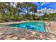 Inviting community pool with ample deck space for lounging at 19728 Sw 83Rd Place Rd # A-1, Dunnellon, FL 34432