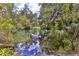 Peaceful river view, lush foliage, and tranquil waters at 19728 Sw 83Rd Place Rd # A-1, Dunnellon, FL 34432