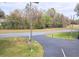 View of a road and surrounding trees at 19728 Sw 83Rd Place Rd # A-1, Dunnellon, FL 34432