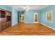 Spacious bedroom with hardwood floors and built-in shelving at 7629 Sw 188 Ave, Dunnellon, FL 34432