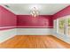 Formal dining room with hardwood floors and a window seat at 7629 Sw 188 Ave, Dunnellon, FL 34432